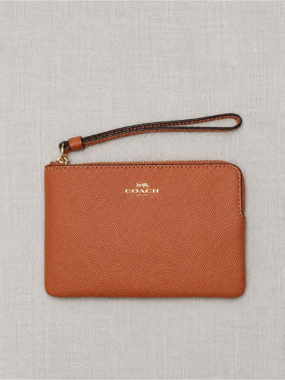 Coach Pebbled Leather Wristlet in Tan Brown with Gold Logo